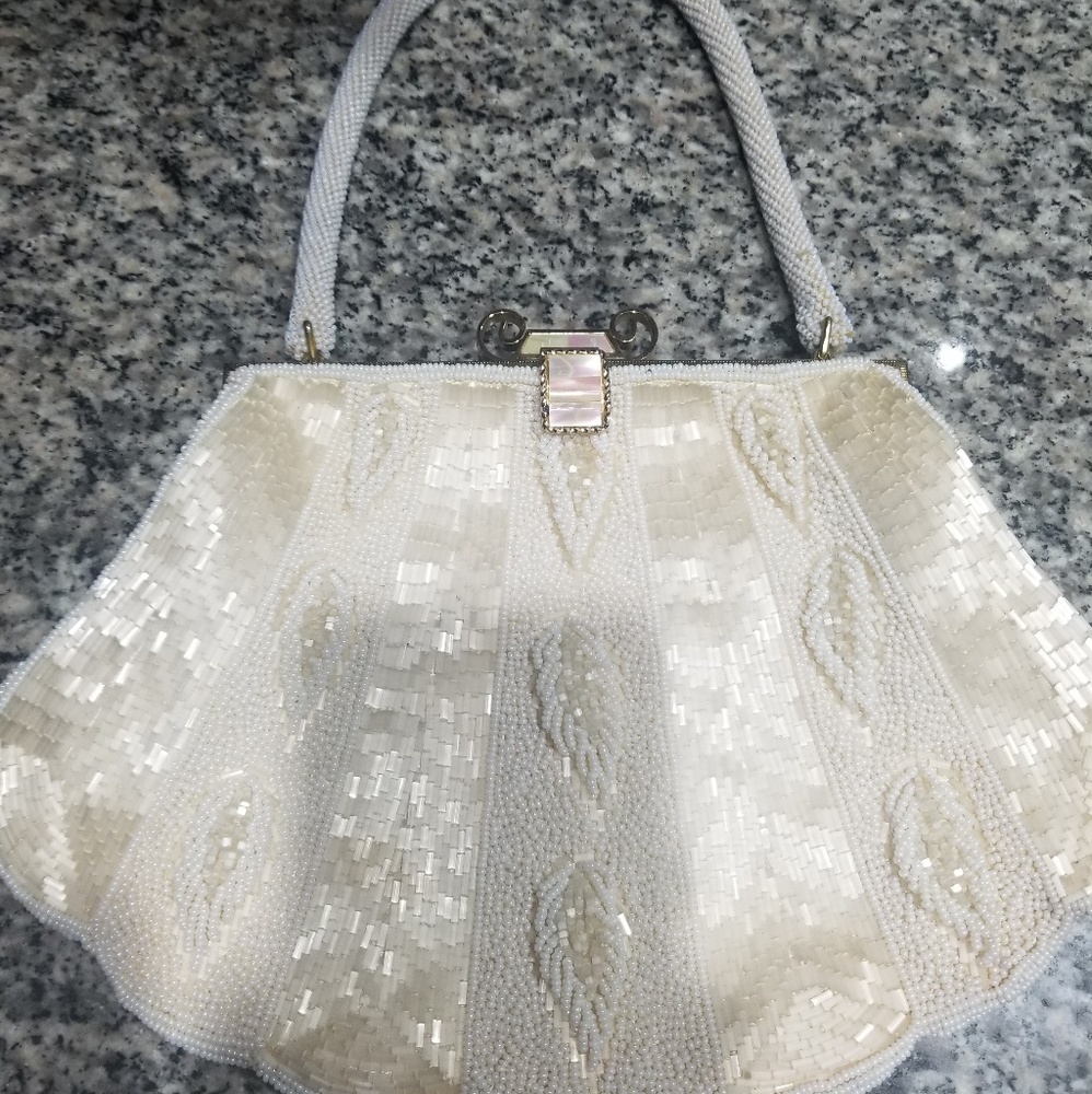 White pearl and sequined clutch